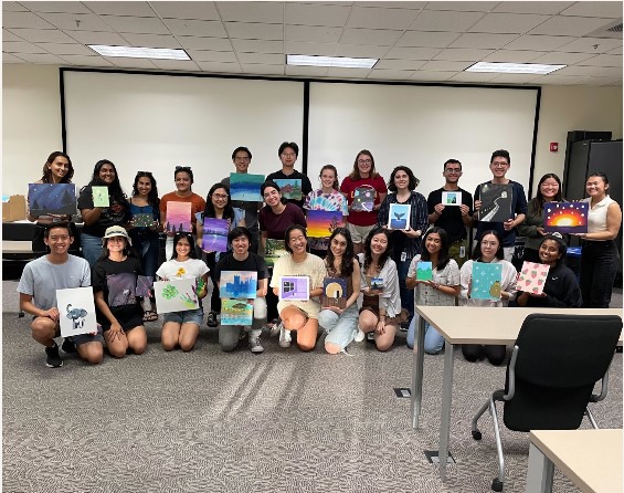 Students painting during Paint Night 2023–2024